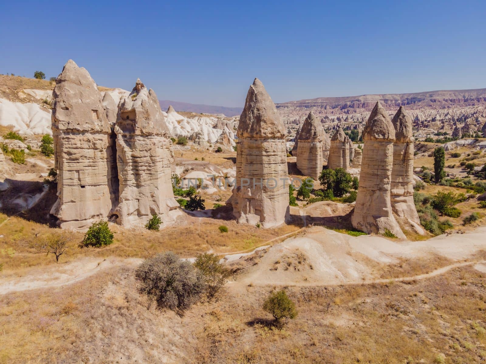 Unique geological formations in Love Valley in Cappadocia, popular travel destination in Turkey by galitskaya