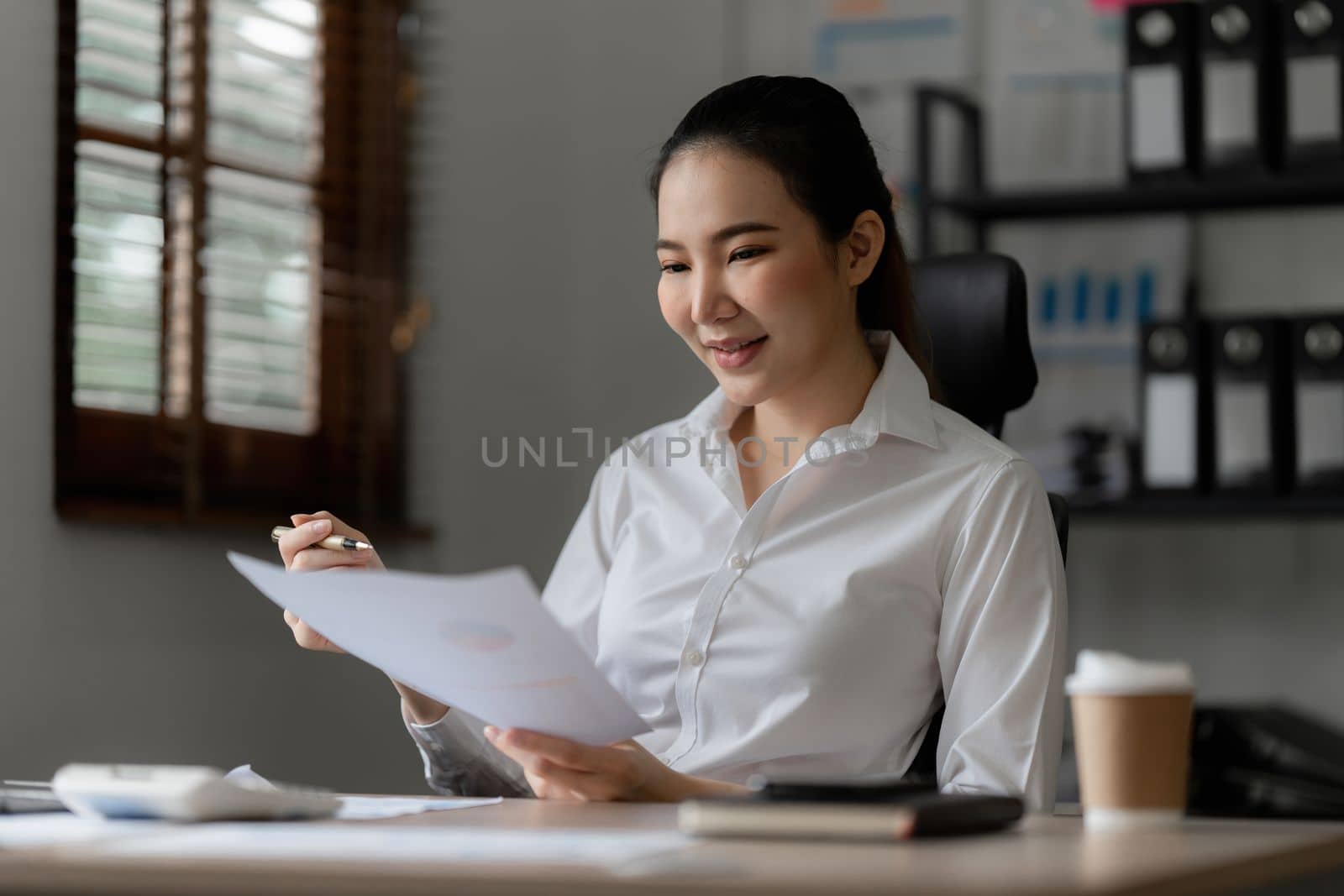 Business Documents, Auditor businesswoman searching document legal prepare paperwork and report for analysis TAX time, accountant Documents data contract partner deal in workplace.