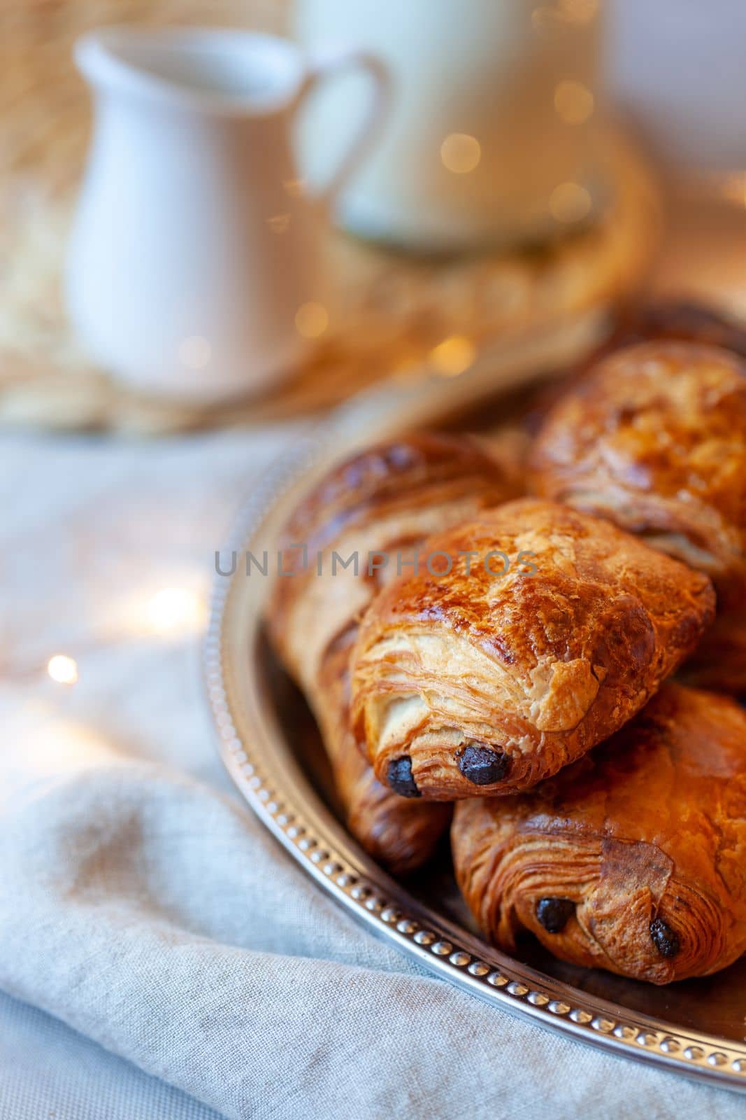 pain au chocolat, french sweet pastry speciality, side view, selective focus