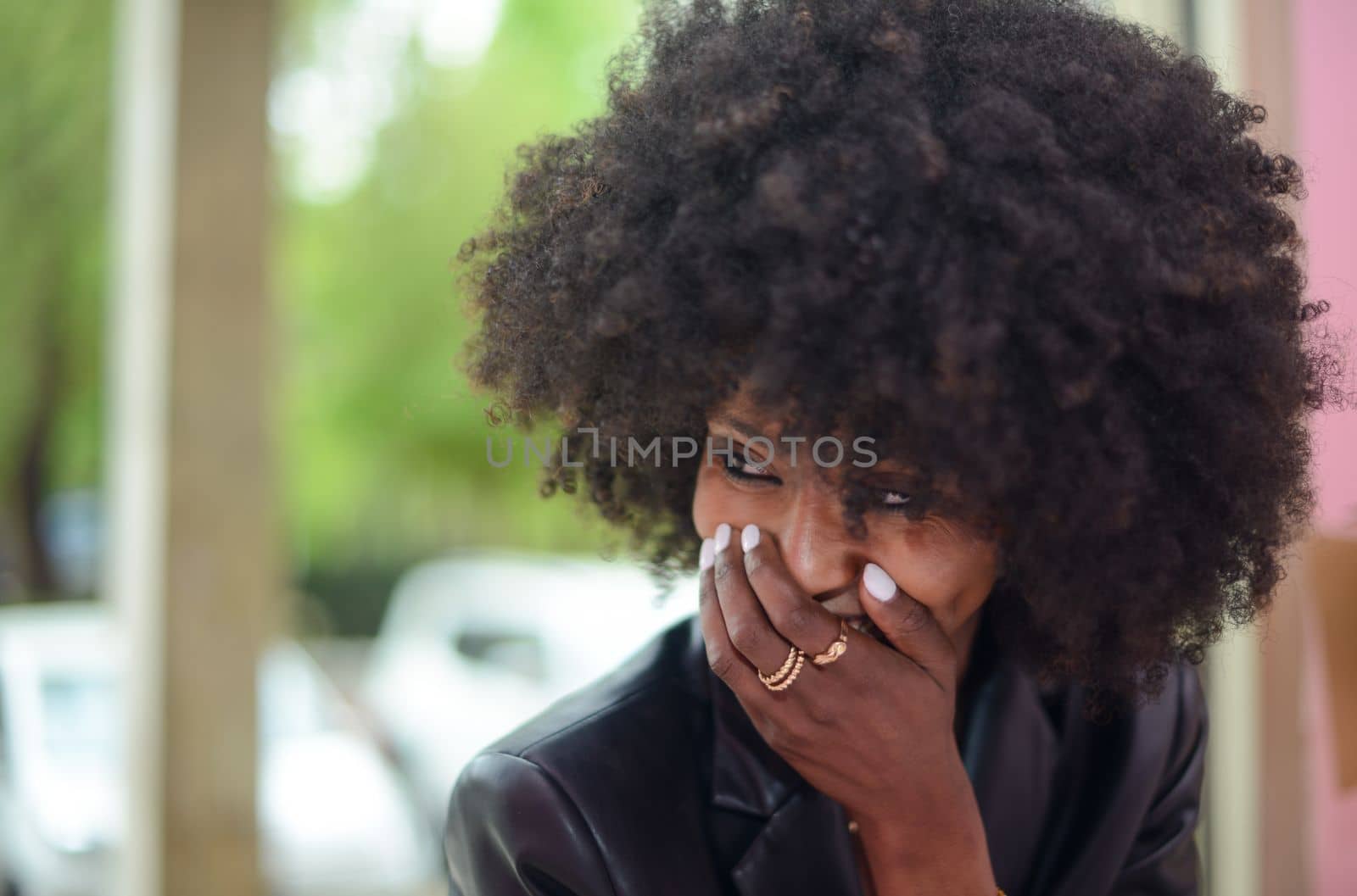 Young attractive African woman with happy cheerful smile having fun
