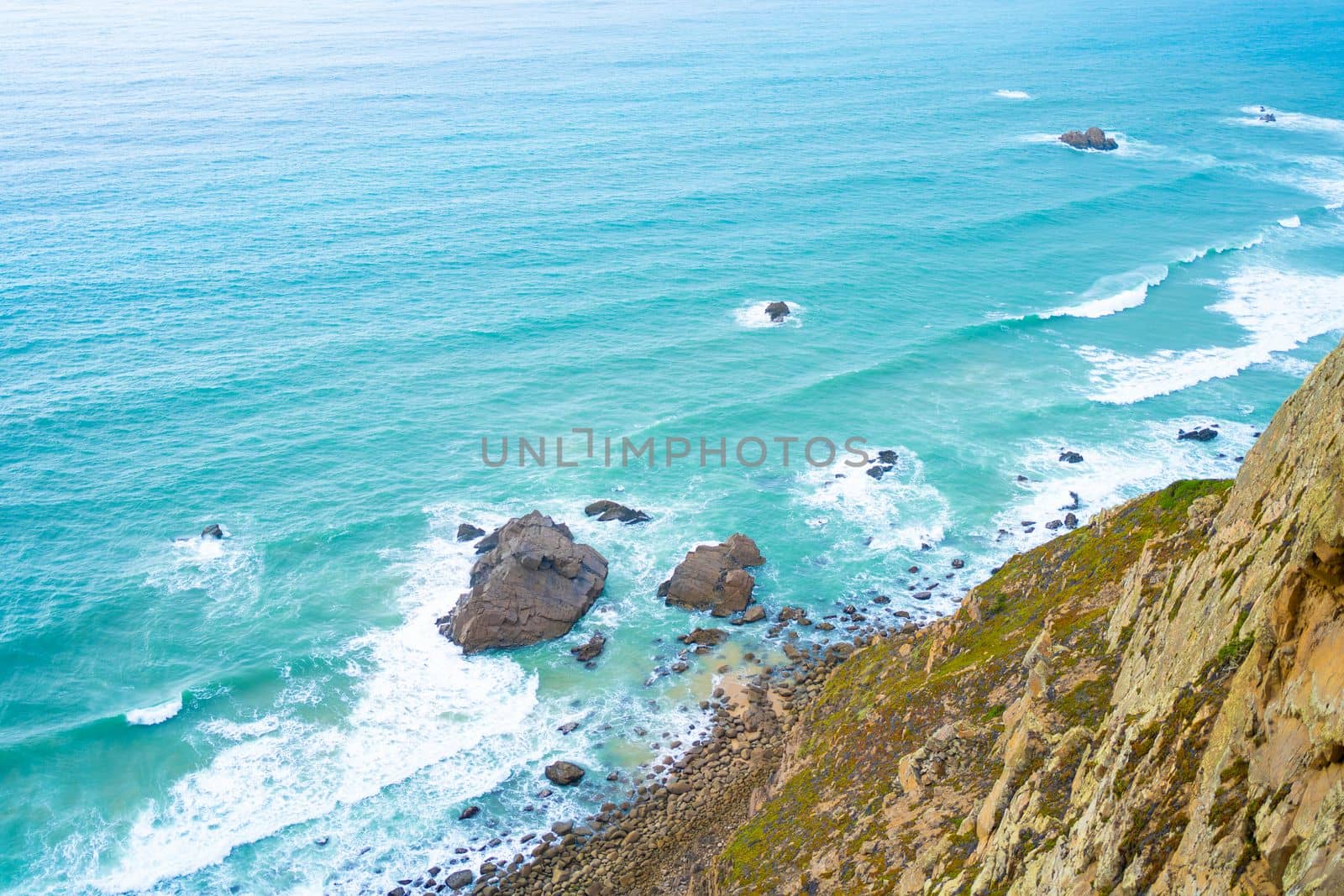 Atlantic ocean view with cliff. View of Atlantic Coast at Portugal, Cabo da Roca. Summer day. Seaside. Coastline. Beautiful landscape