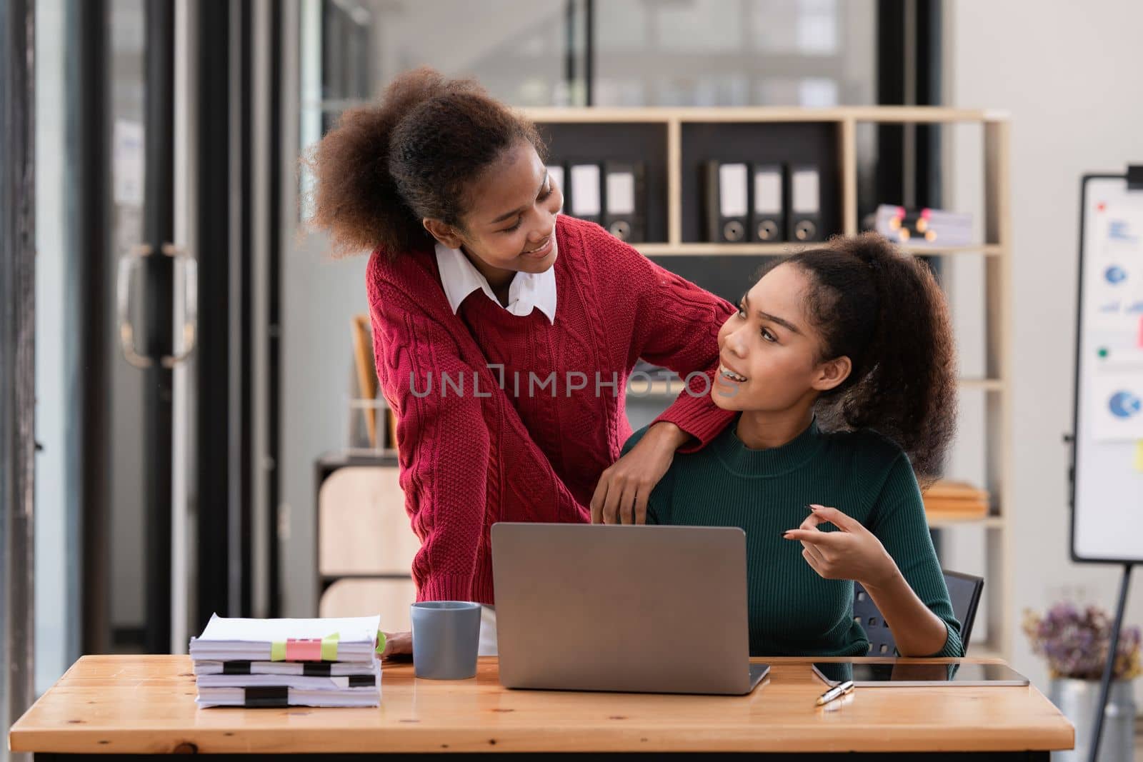 Two Black Business women at casual meeting room discussing and brainstorm idea about marketing. Business consult concept.