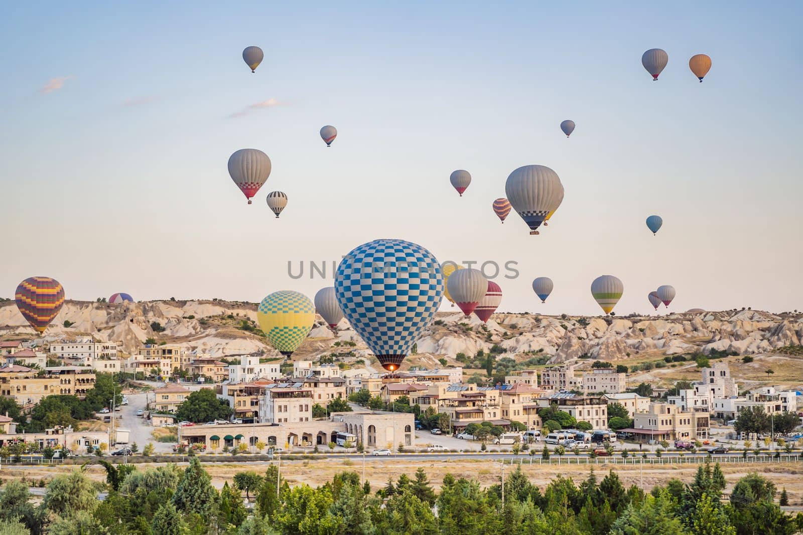 Colorful hot air balloon flying over Cappadocia, Turkey by galitskaya