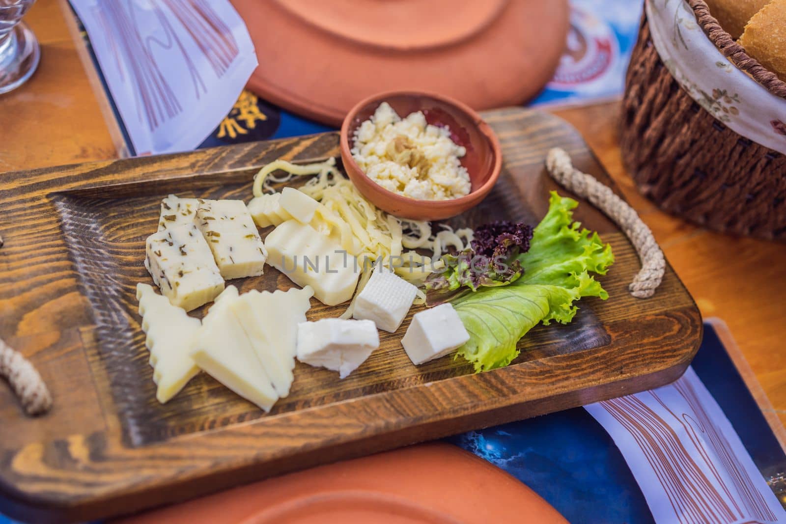 Turkish breakfast cheese. Pastries. Vegetables. Olives. Cheeses, fried eggs. Jams, tea in copper pot and tulip glasses. Wide composition.