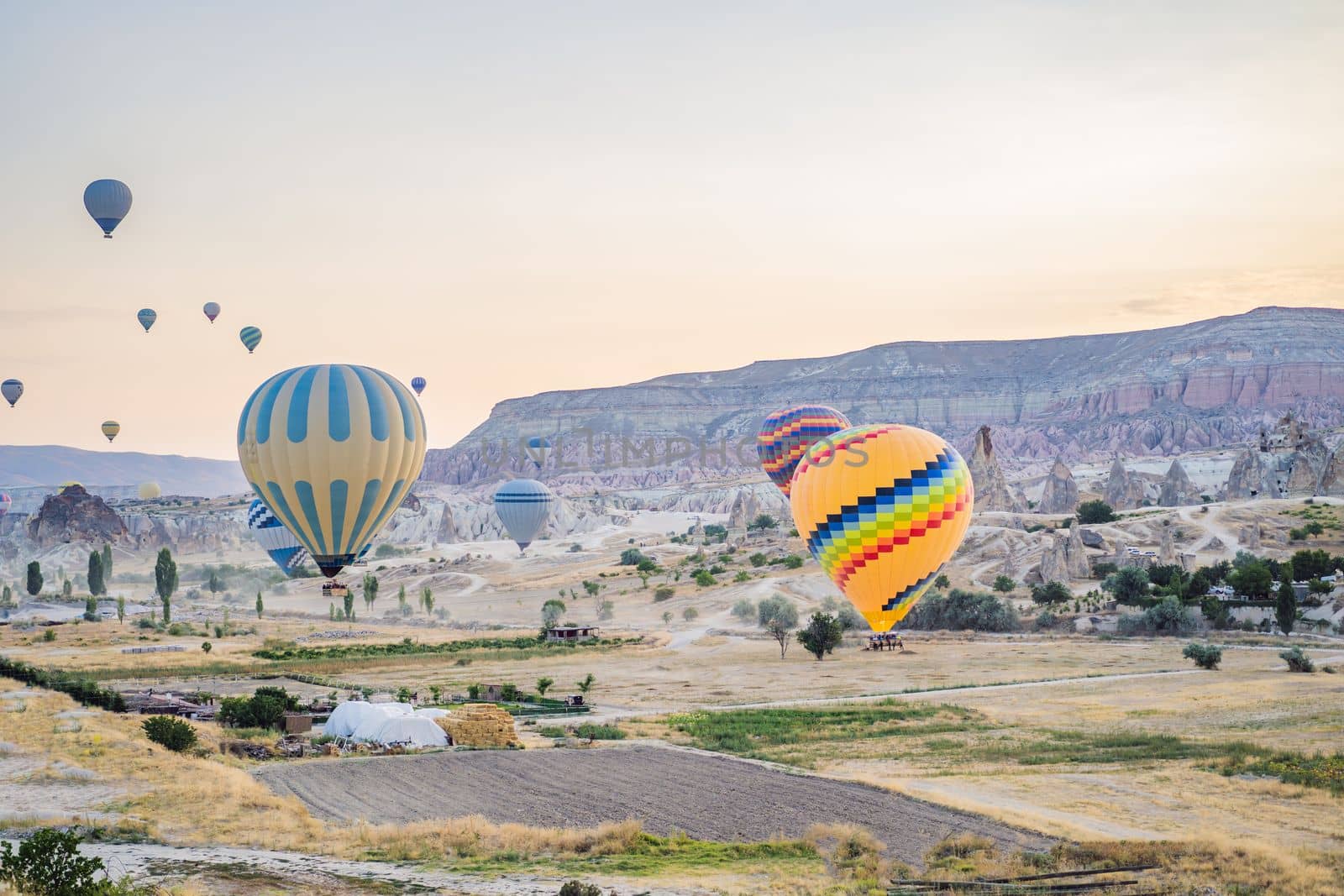 Colorful hot air balloon flying over Cappadocia, Turkey.