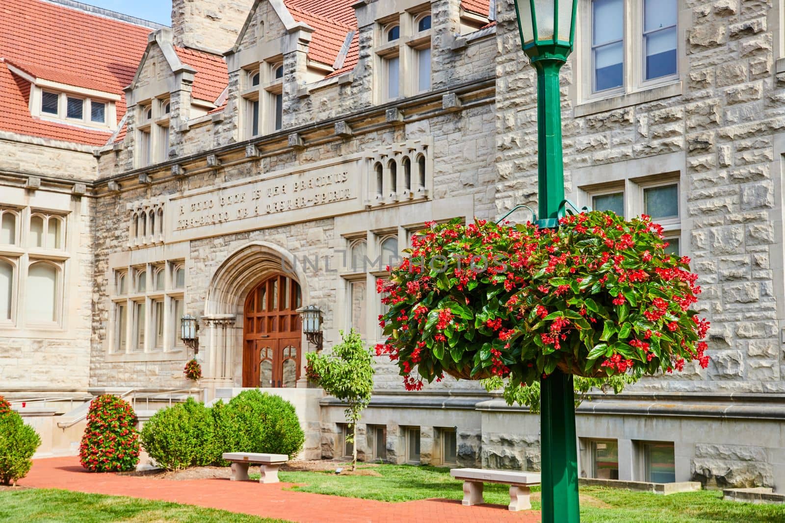 Image of Indiana University college campus exterior buildings with flowers