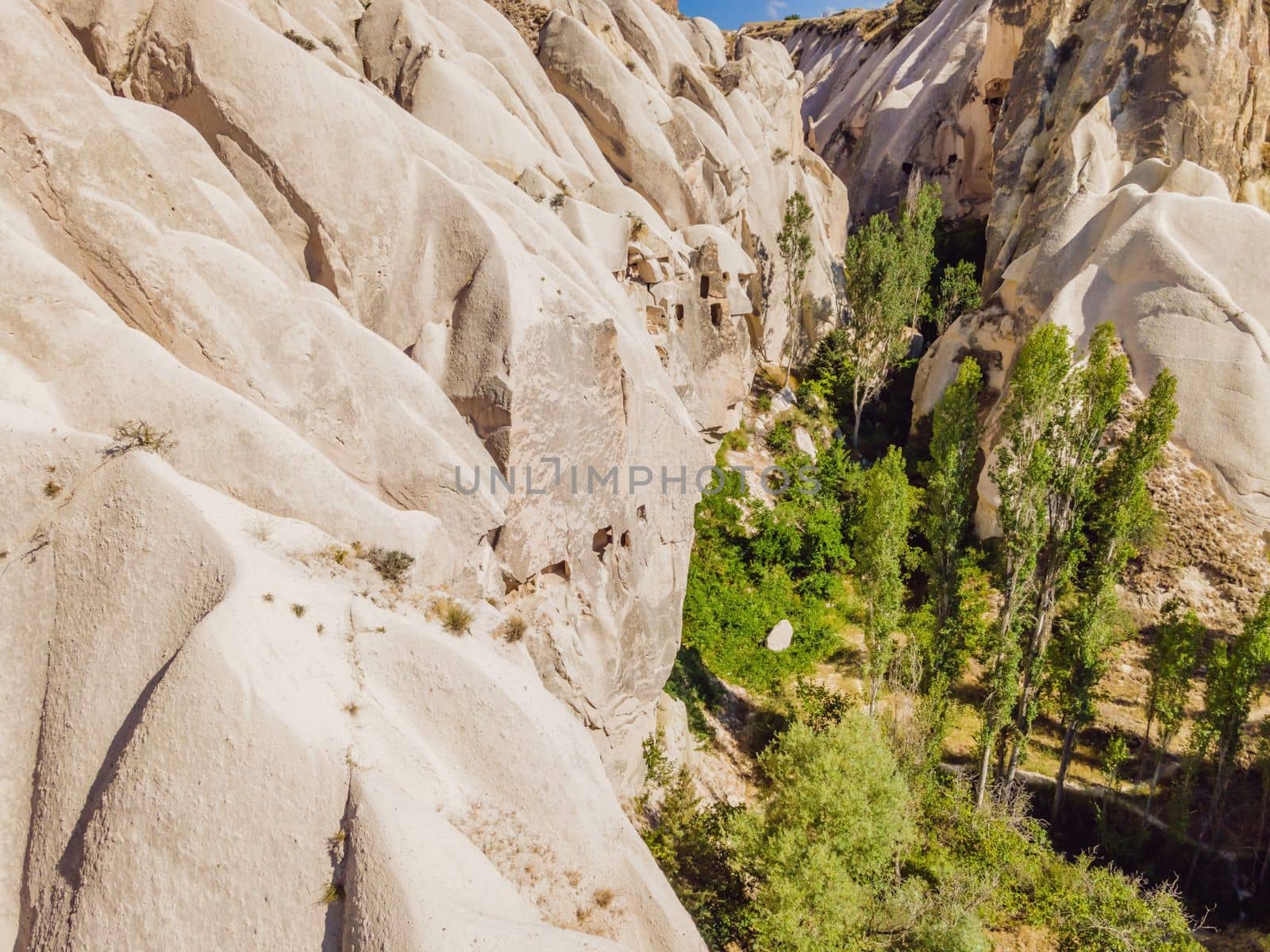 Beautiful stunning view of the mountains of Cappadocia and cave houses. Turkey by galitskaya