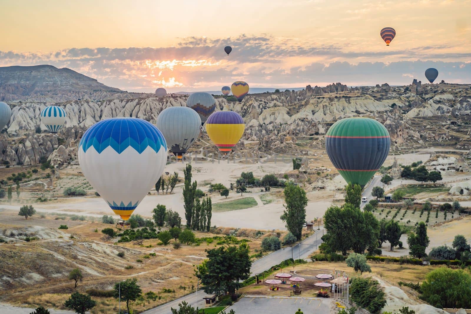 Colorful hot air balloon flying over Cappadocia, Turkey by galitskaya