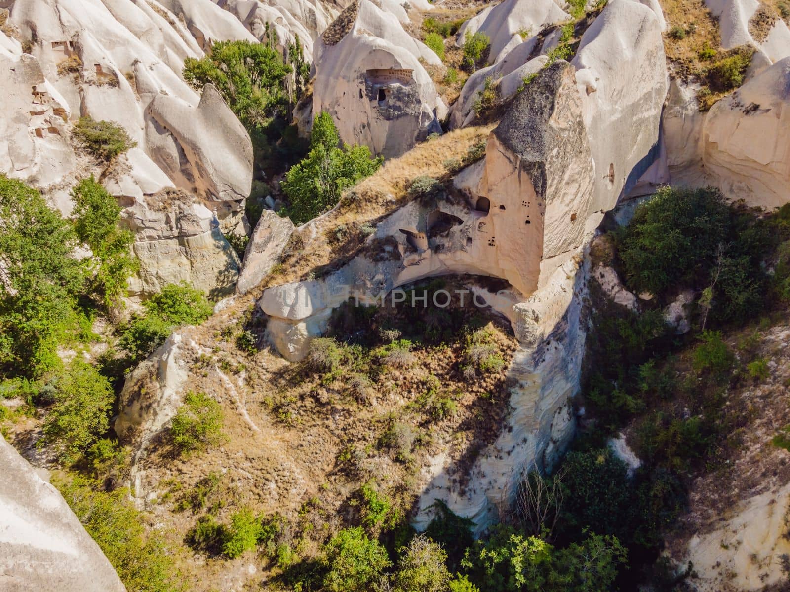 Beautiful stunning view of the mountains of Cappadocia and cave houses. Turkey by galitskaya