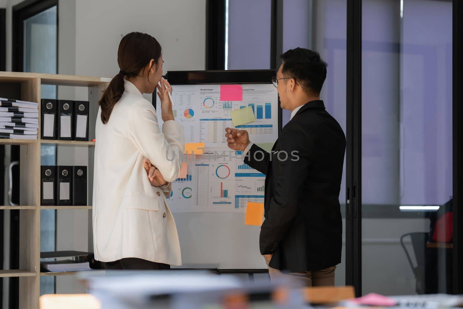Group of business consultant working management big data and analyze financial document of company.