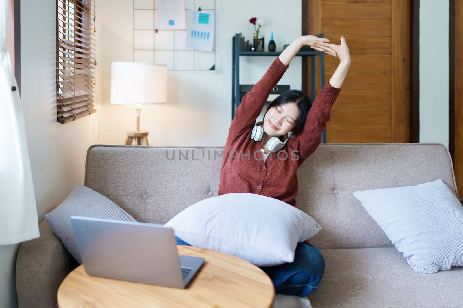 Portrait of a beautiful Asian teenage girl using a computer.