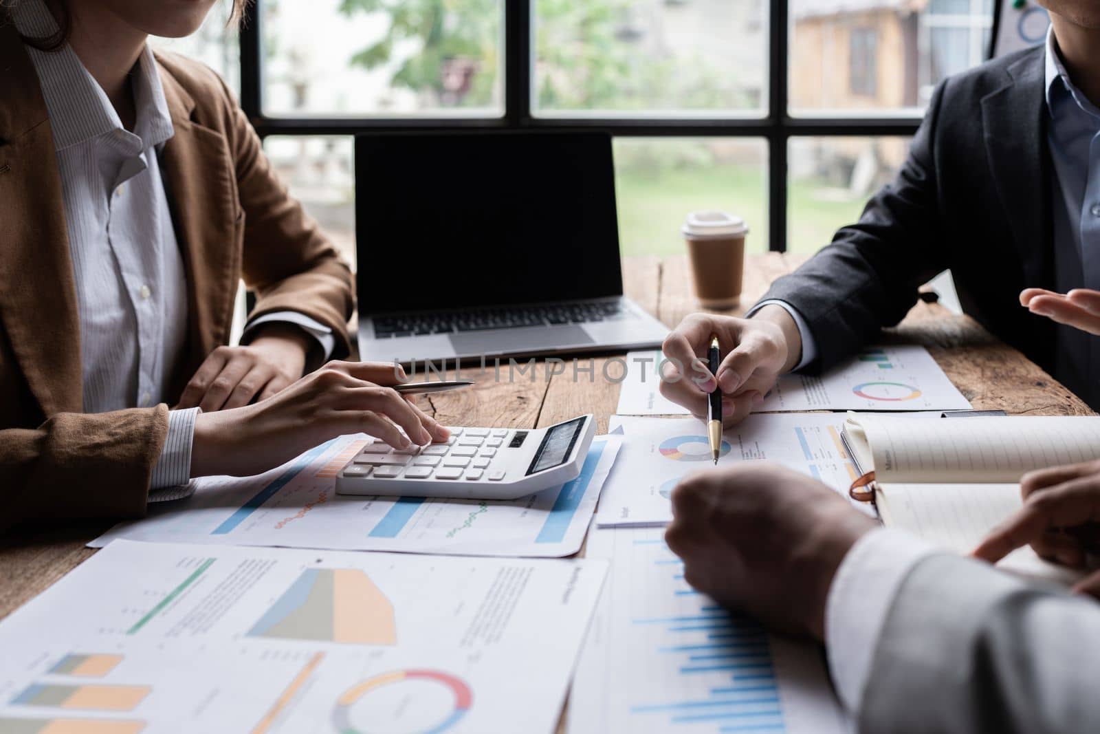 Business advisers are gathering to assess and debate the issue as it appears on the financial report. Financial counselor, investment consultant, and accounting concept.