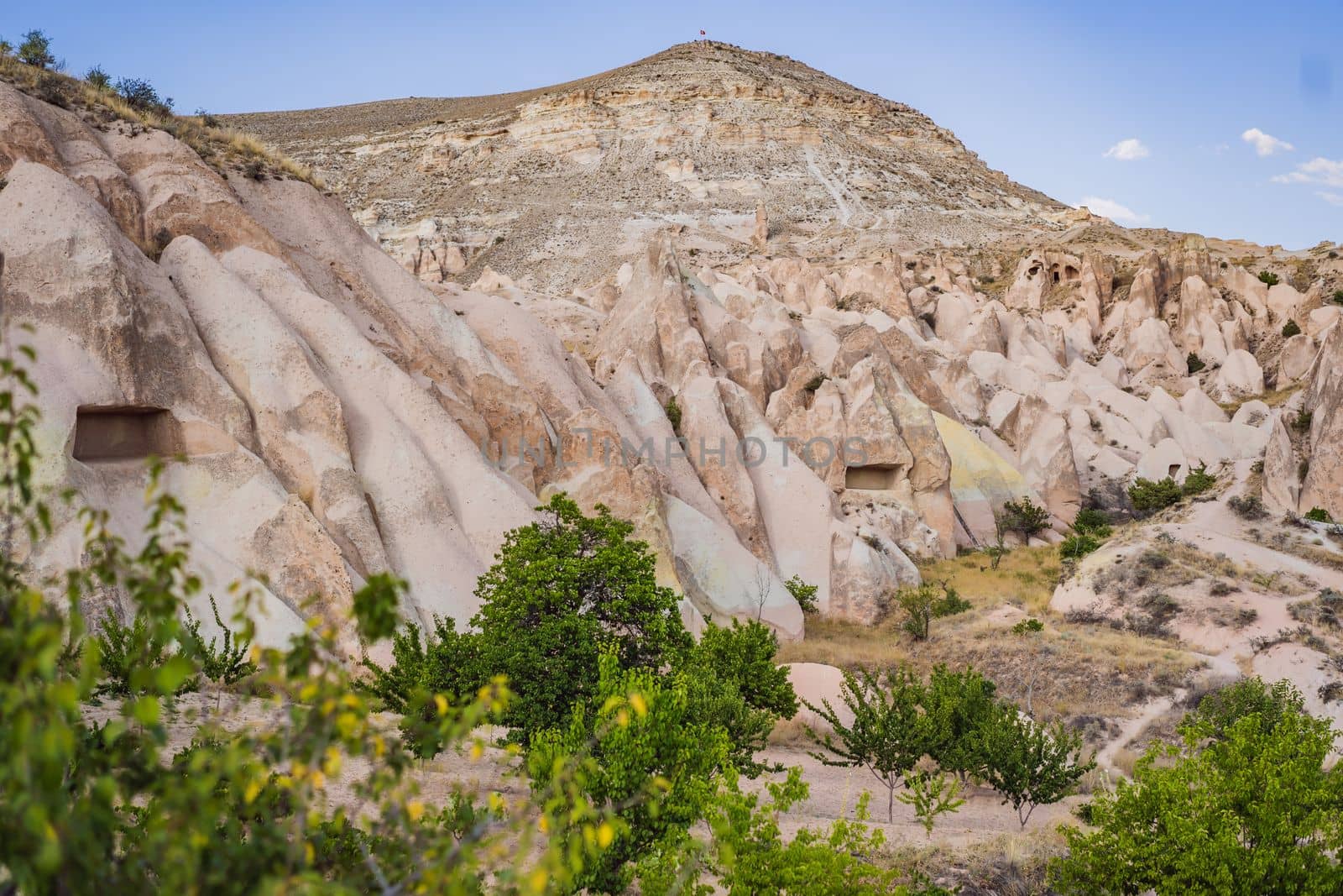 Beautiful stunning view of the mountains of Cappadocia and cave houses. Turkey by galitskaya