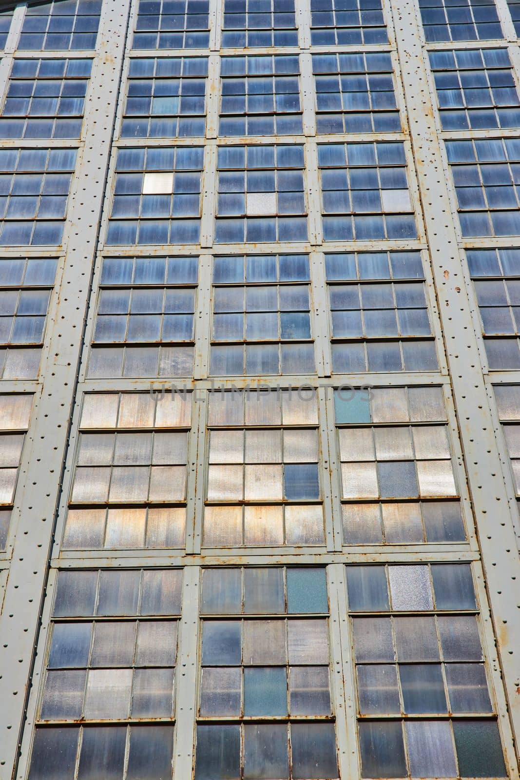 Image of Endless shades of industrial windows on exterior of building