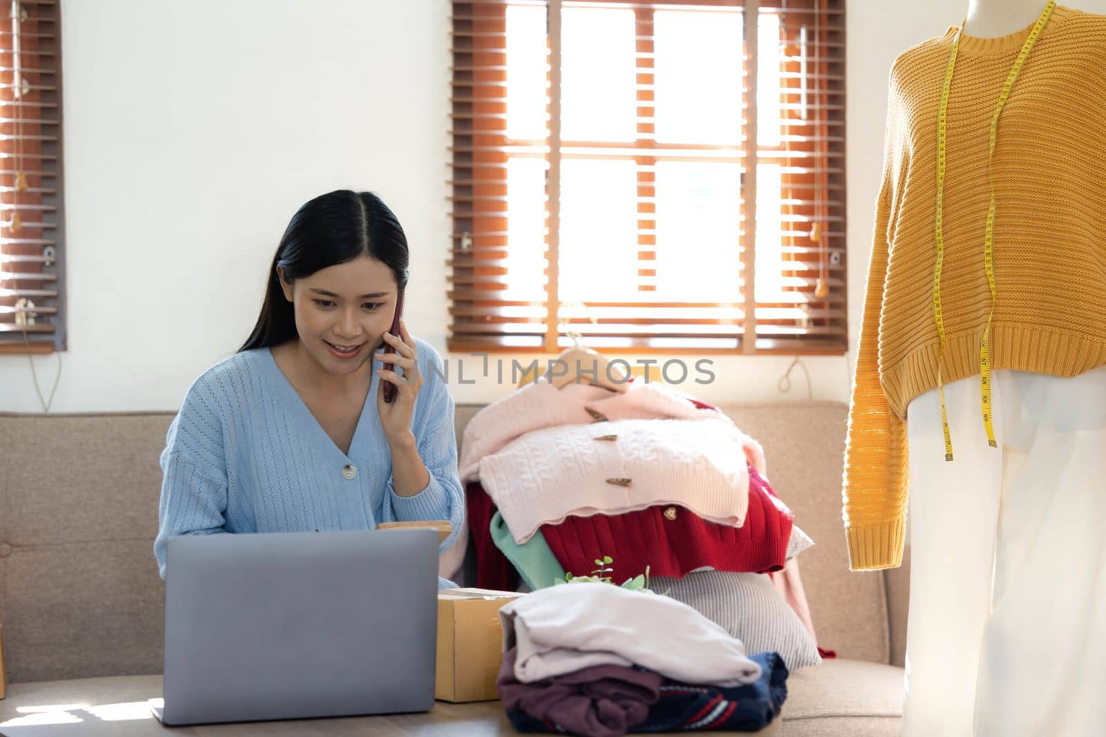 Startup small business entrepreneur SME, asian woman packing box. Portrait of young Asian small business owner in home office, online sell marketing delivery