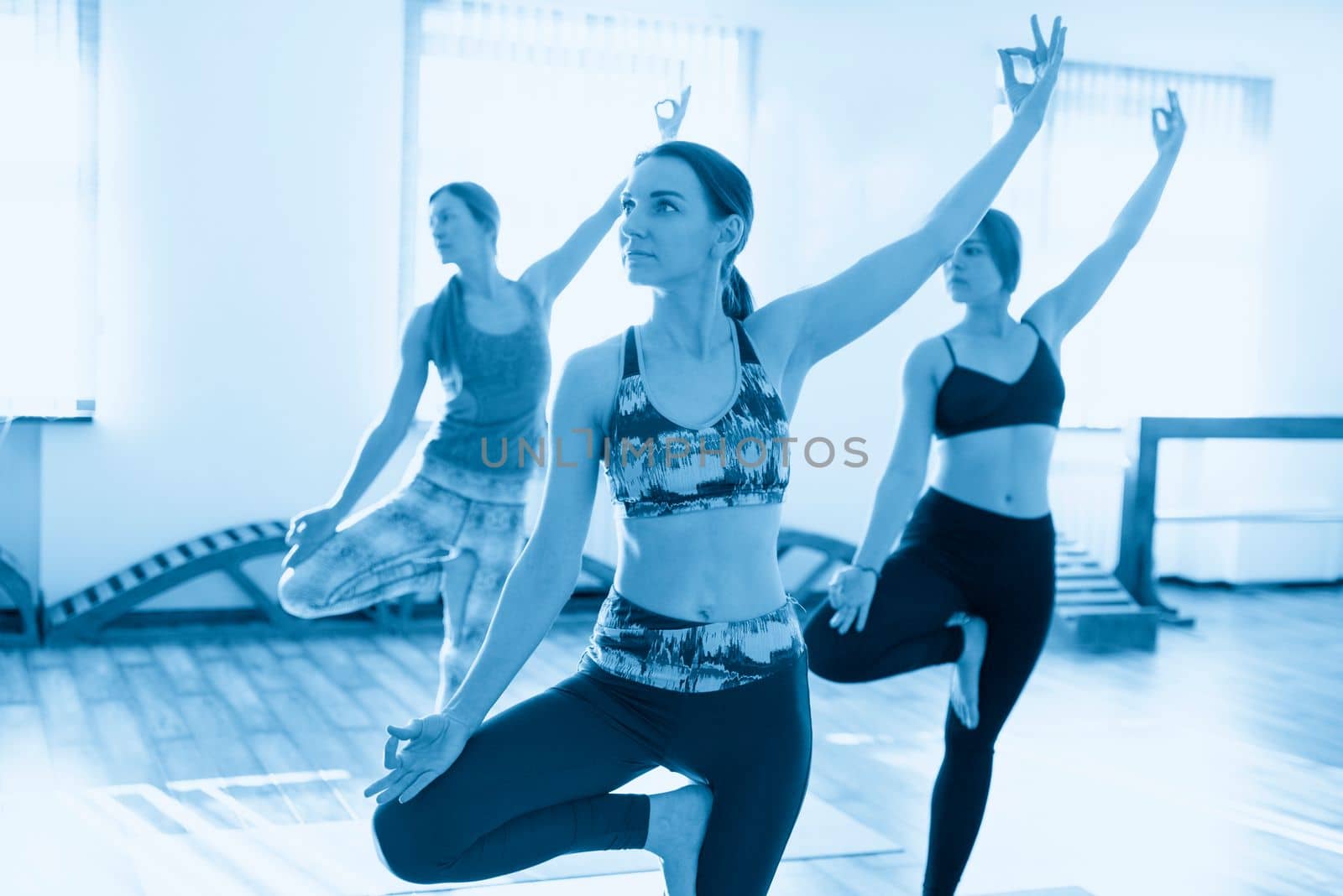 Yoga Class, Group of People Relaxing and Doing Yoga pose