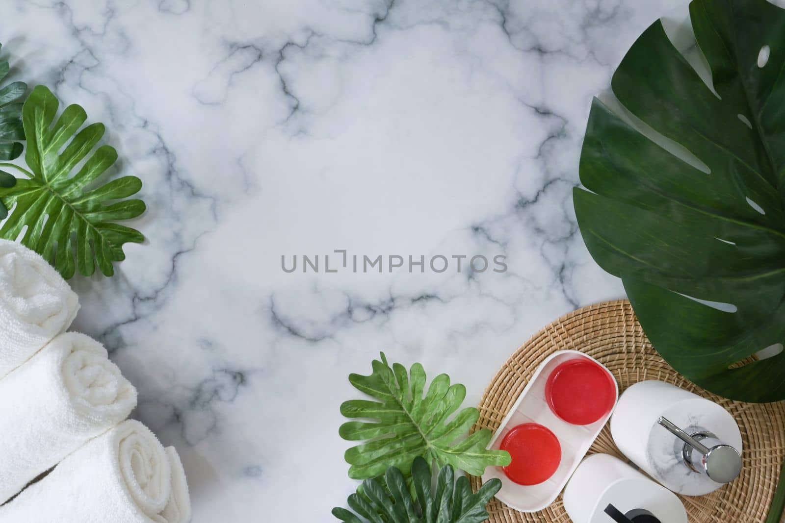Organic soaps and towels on marble background. by prathanchorruangsak