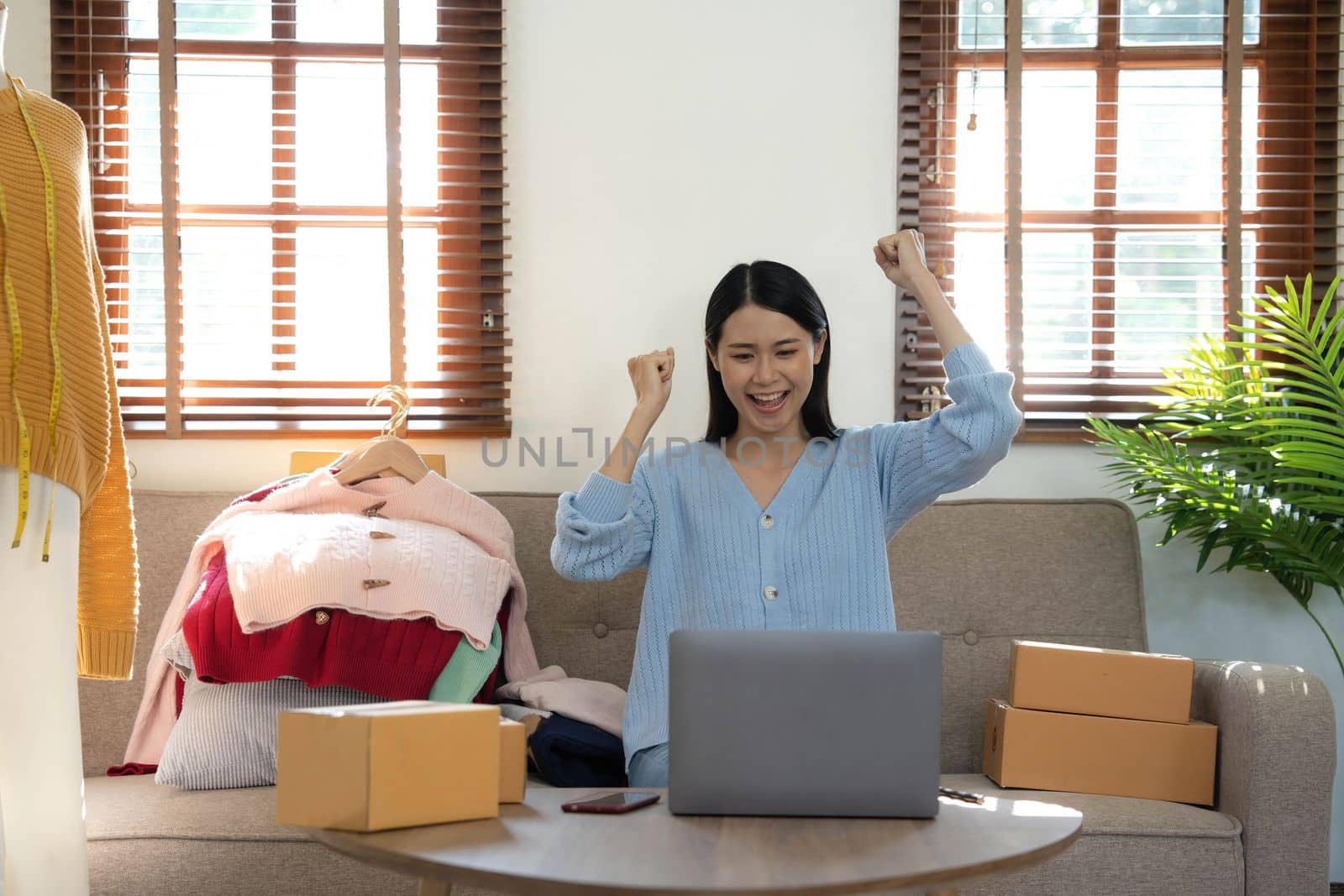 Startup small business entrepreneur SME, asian woman packing box. Portrait of young Asian small business owner in home office, online sell marketing delivery