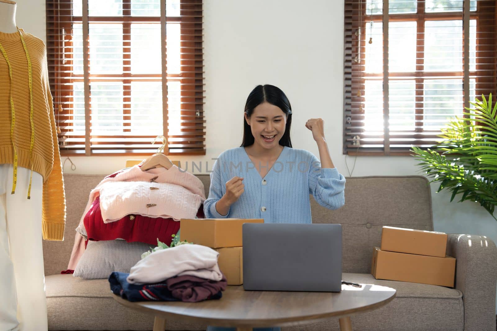 Startup small business entrepreneur SME, asian woman packing box. Portrait of young Asian small business owner in home office, online sell marketing delivery