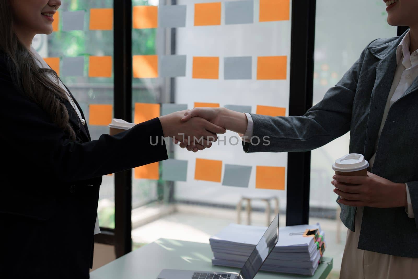 Business partnership meeting concept. Image businessmans handshake. Successful businessmen handshaking after good deal. Group support concept.