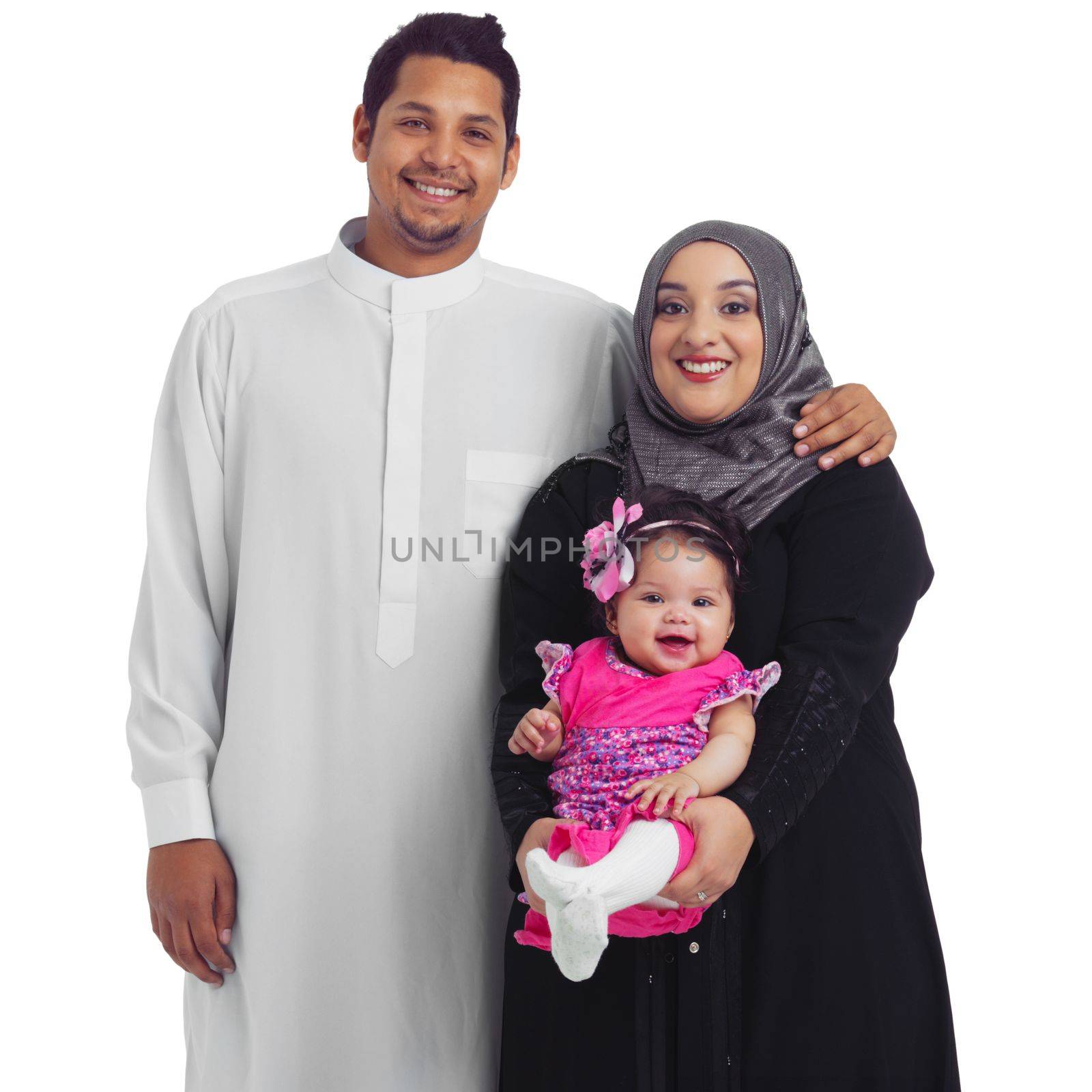 Our family is always smiling. Studio portrait of a happy young muslim family isolated on white. by YuriArcurs