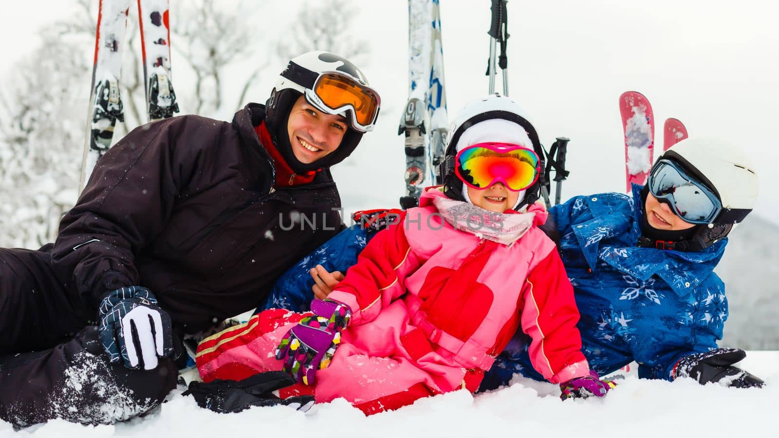 Skiing, winter, snow, sun and fun - family enjoying winter vacations by Andelov13