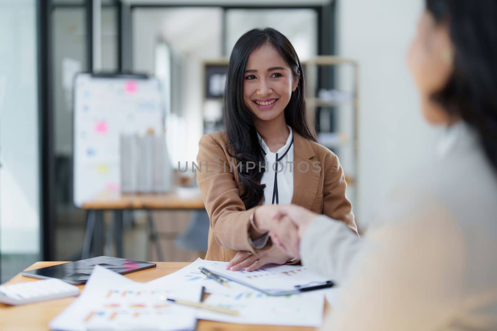 Business partnership meeting concept. Image businessmans handshake. Successful businessmen handshaking after good deal. Group support concept..