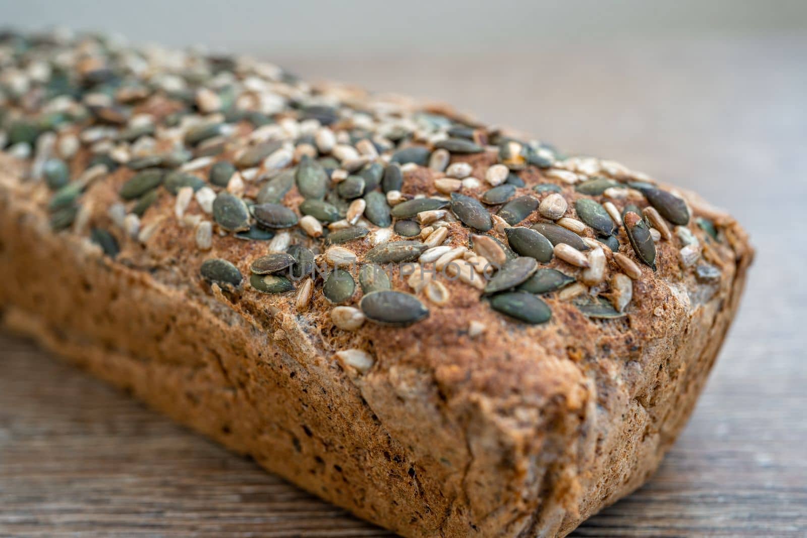 whole grain bread on a wooden table.