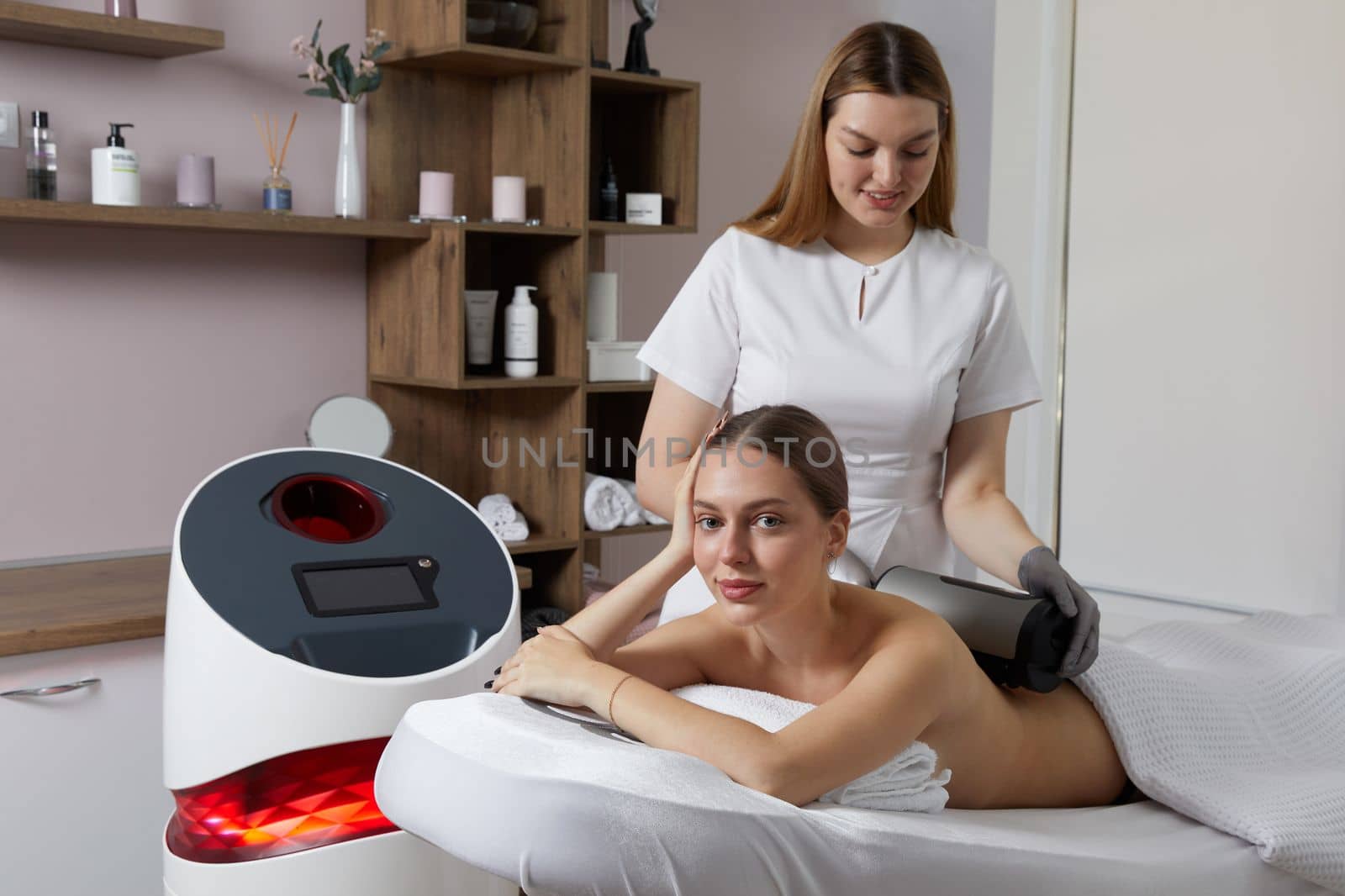 Endosphere therapy of female body by a cosmetologist in beauty salon