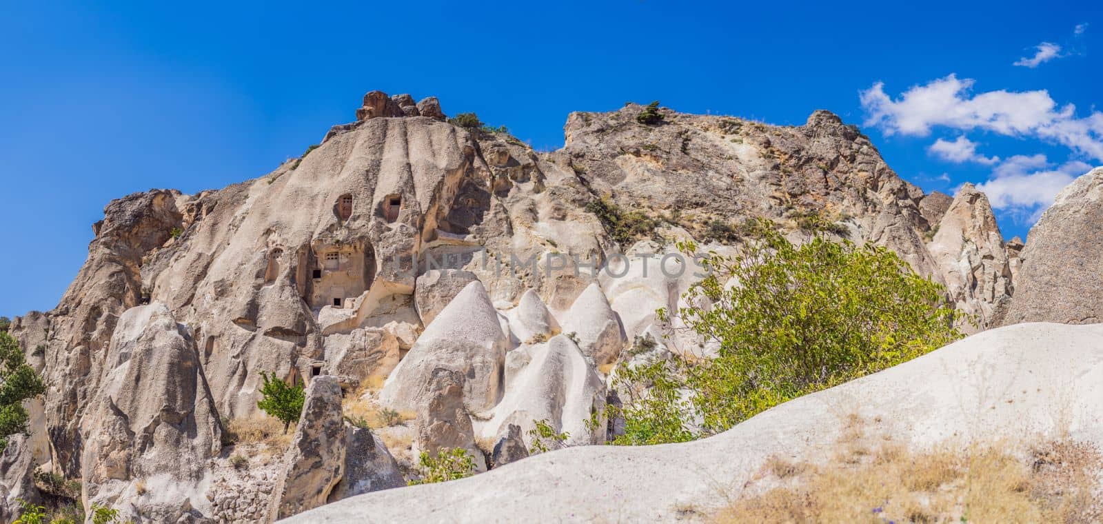 Beautiful stunning view of the mountains of Cappadocia and cave houses. Turkey by galitskaya