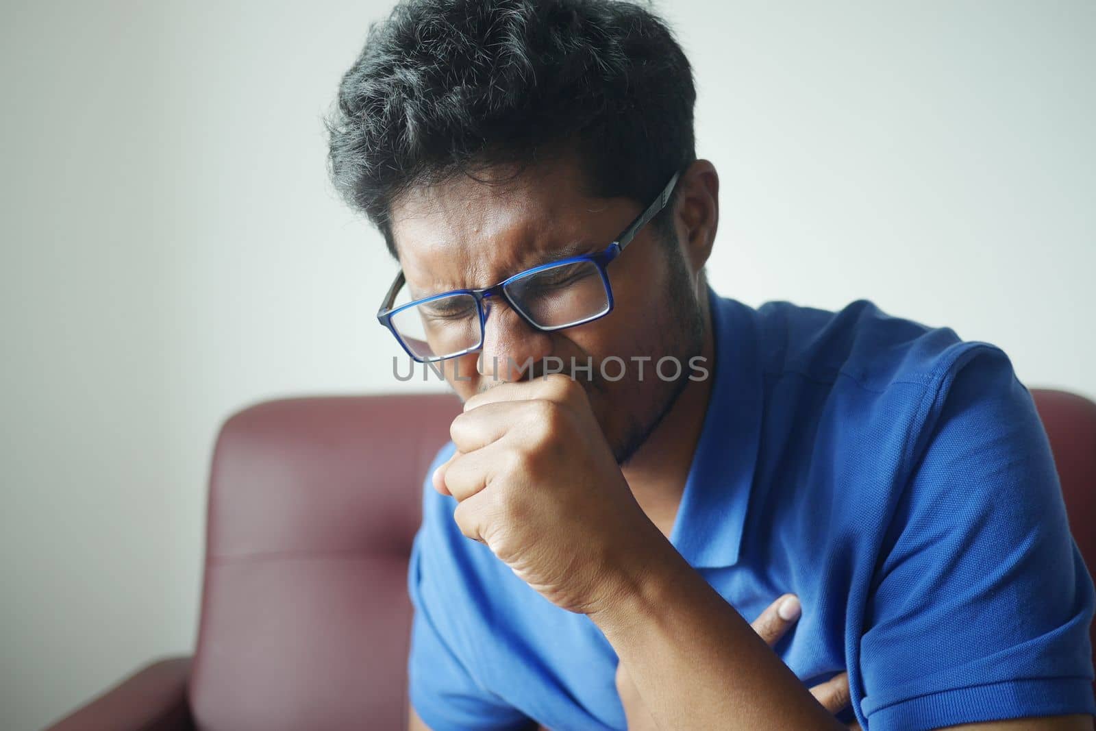 Sick man got flu allergy sneezing and blowing nose