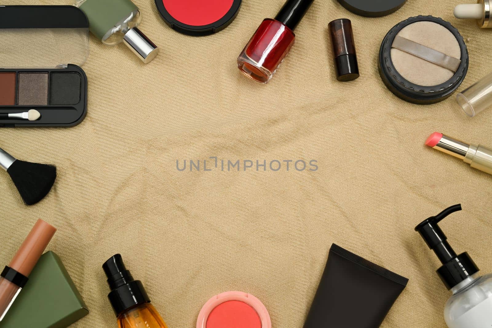 Various cosmetic products set on beige background. Skincare beauty products design and branding.