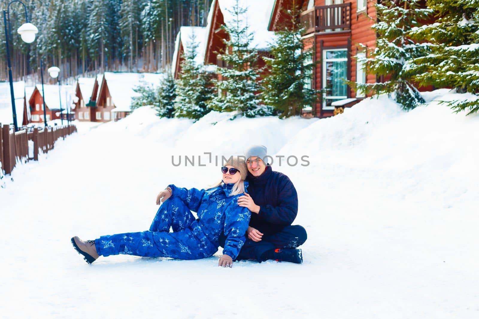 Young happy smiling couple in love. Winter by Andelov13