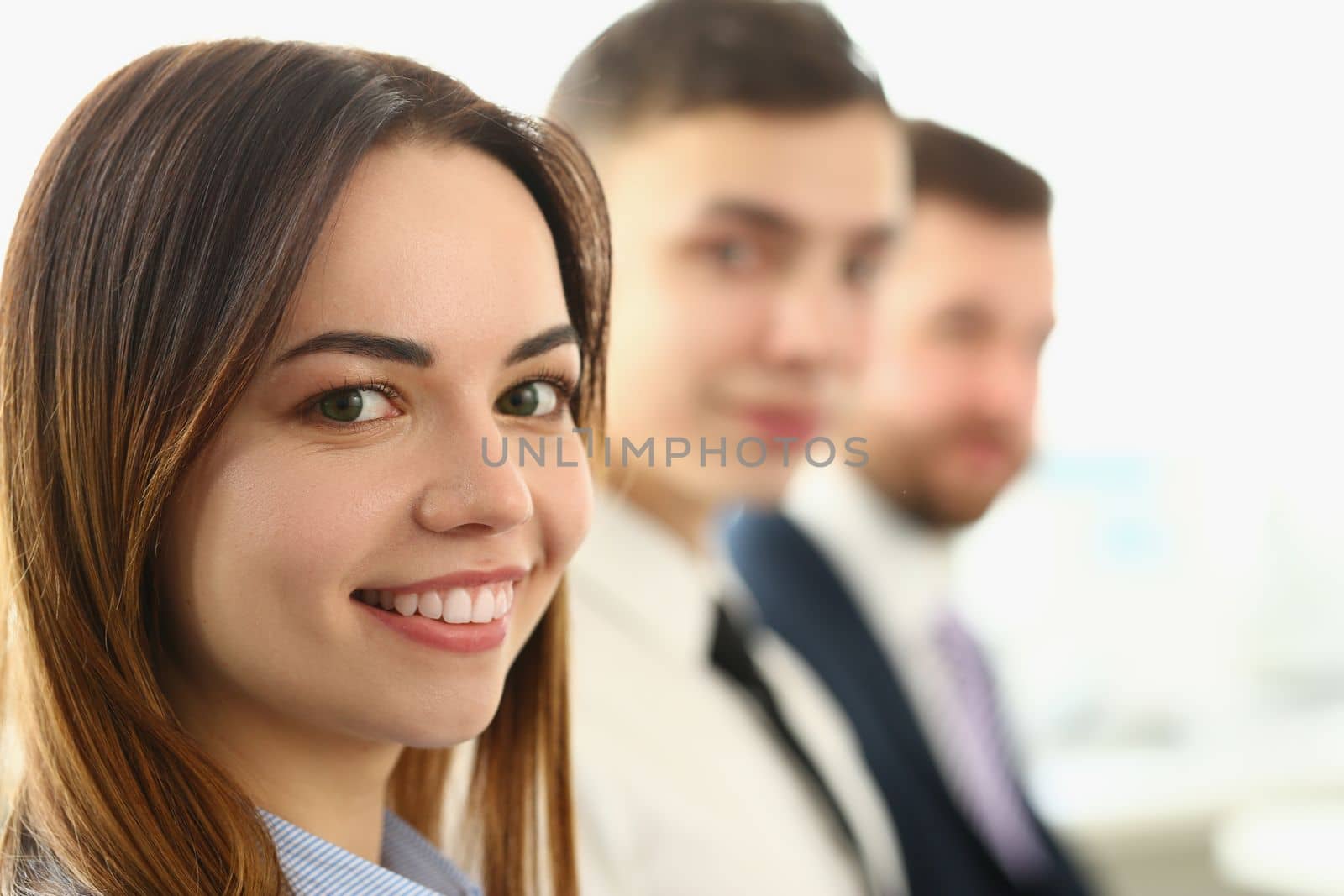 Portrait of young beautiful smiling business people. Students on learning training concept