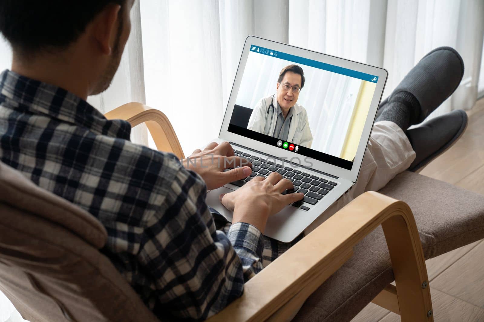 Doctor video call online by modish telemedicine software application for virtual meeting with patient