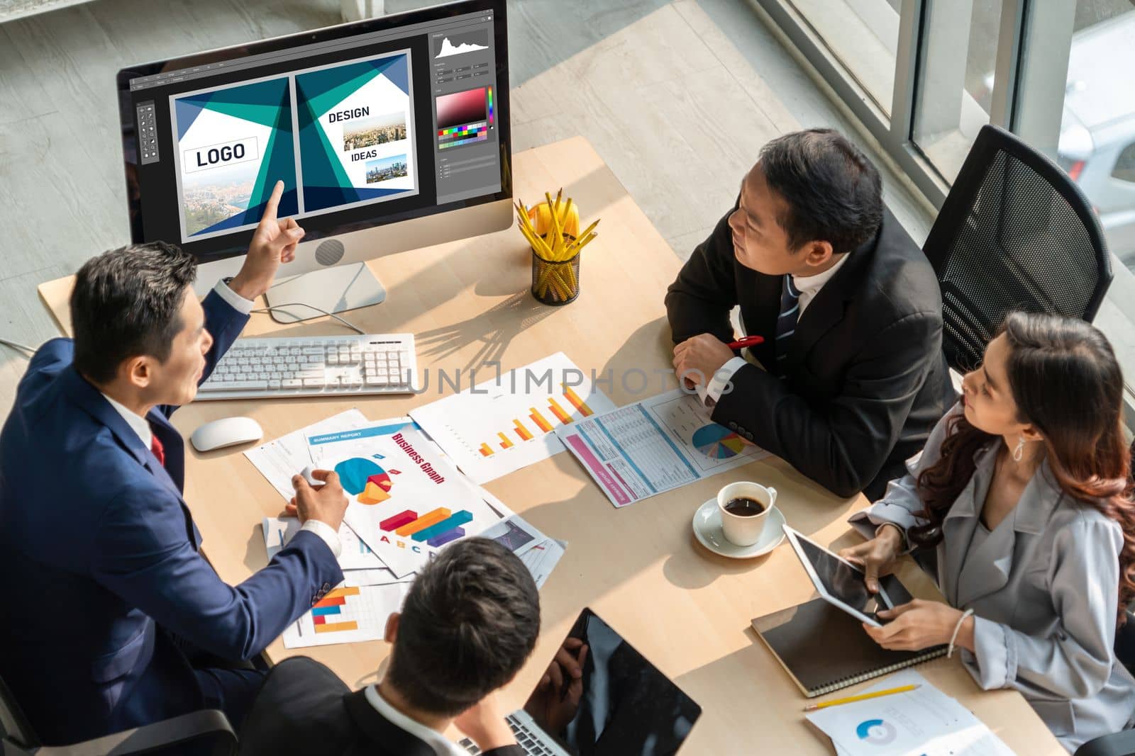 Graphic designer software for modern design of web page and commercial ads showing on the computer screen