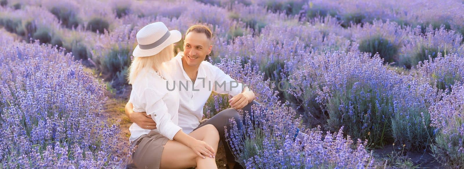 Beautiful couple on the lavender field.