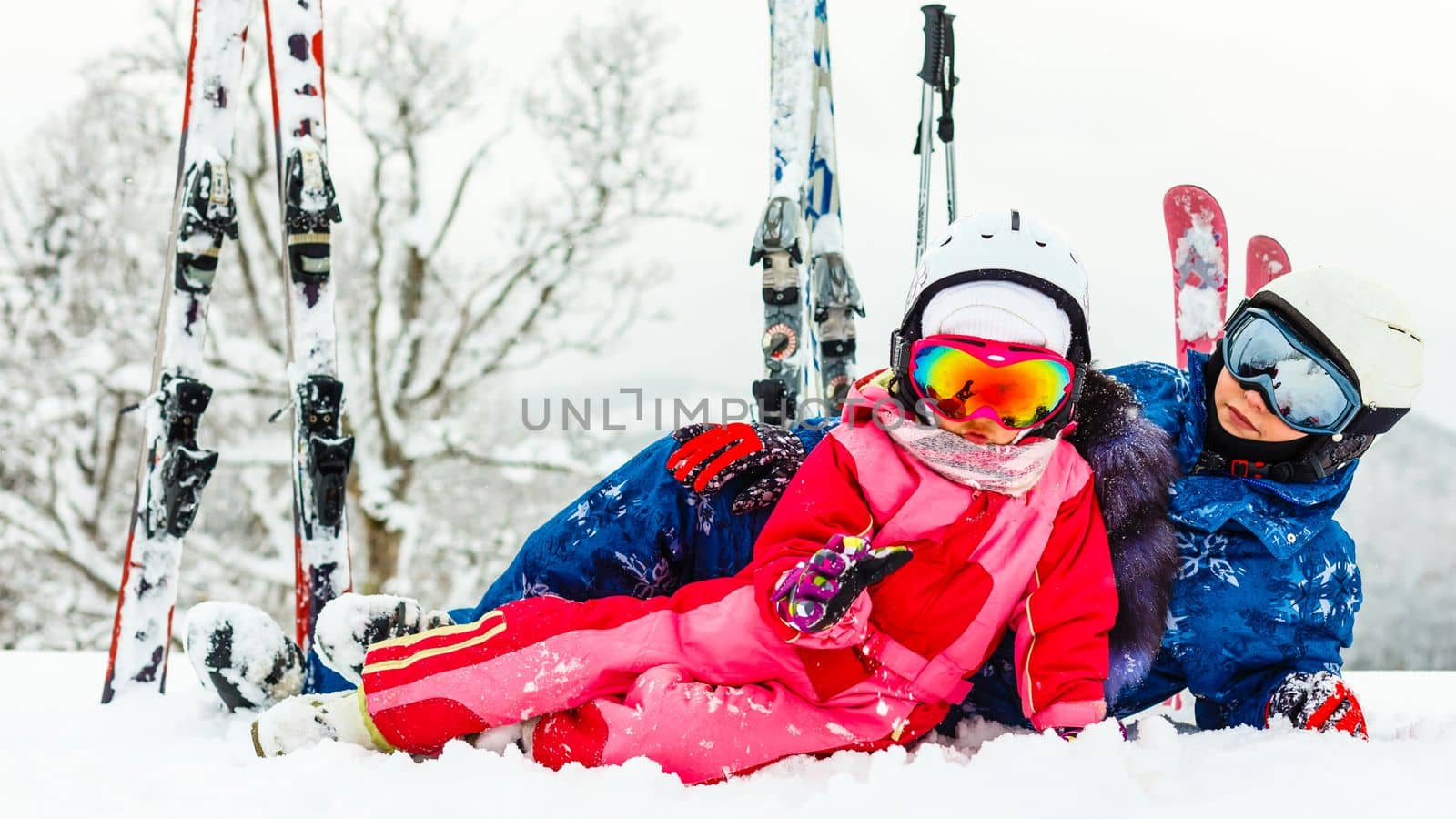 Winter, ski - Little girl with mother in ski resort by Andelov13