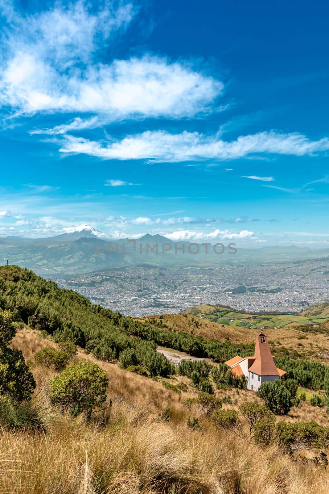 View of volcanoes and mountains above the city of Quito in Ecuador. High quality photo