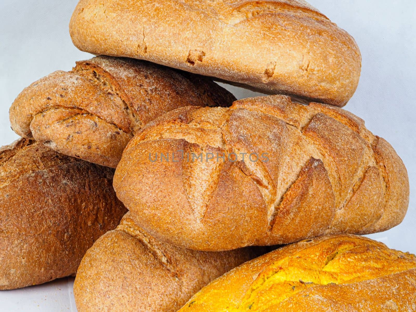 assortment of table bread on white background