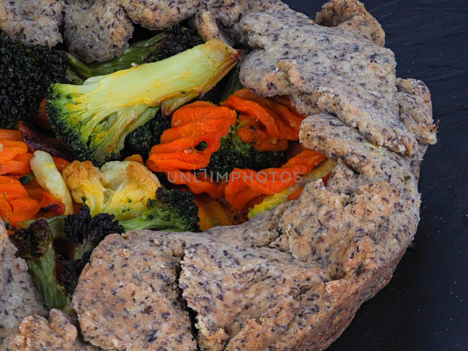 vegetarian salty pie wholewheat organic flour on white background studio shot