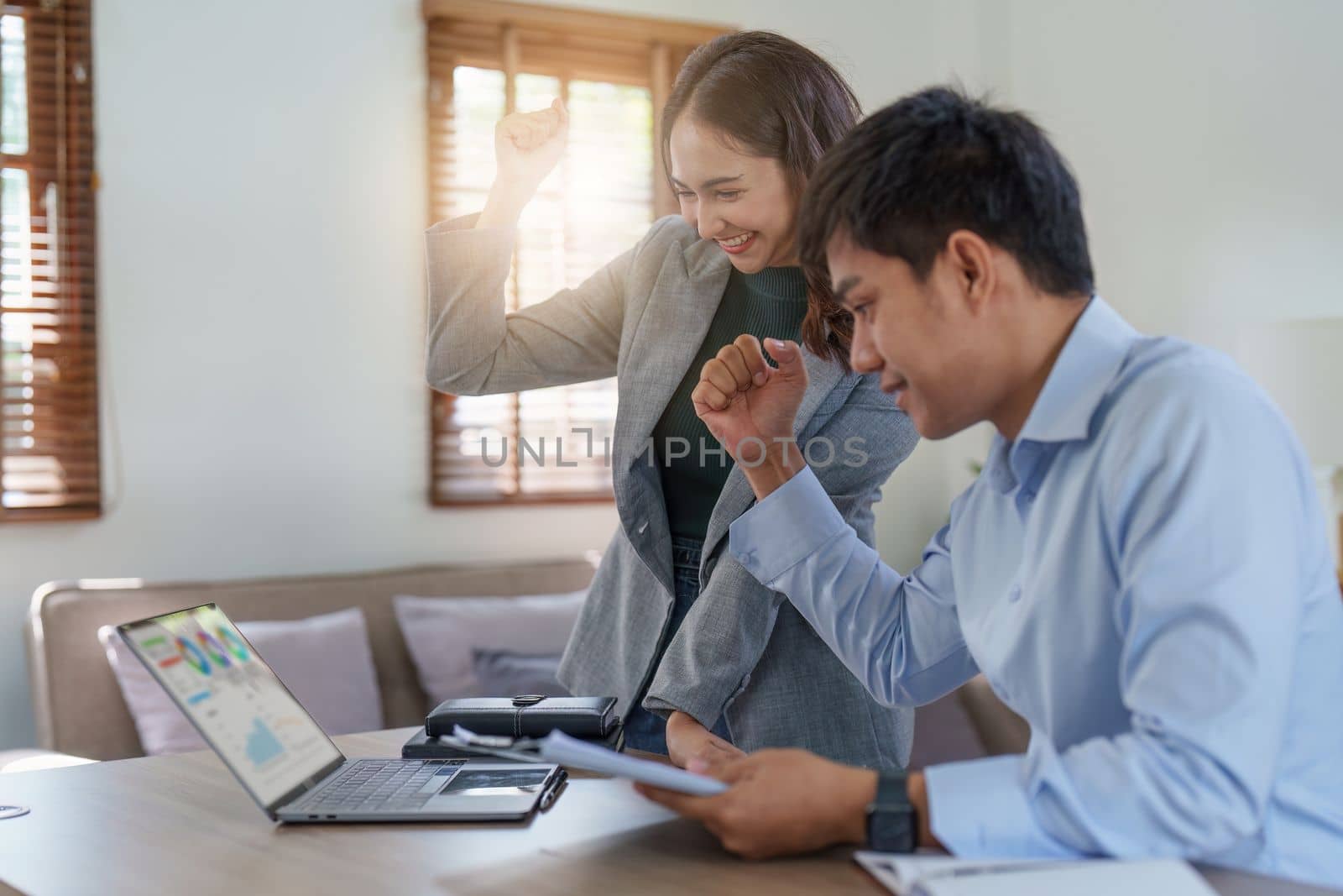 Financial analyst analyzes business people investment consultant analyzing company financial report working with documents graphs. Stock Market Tax Fund Finance concept.