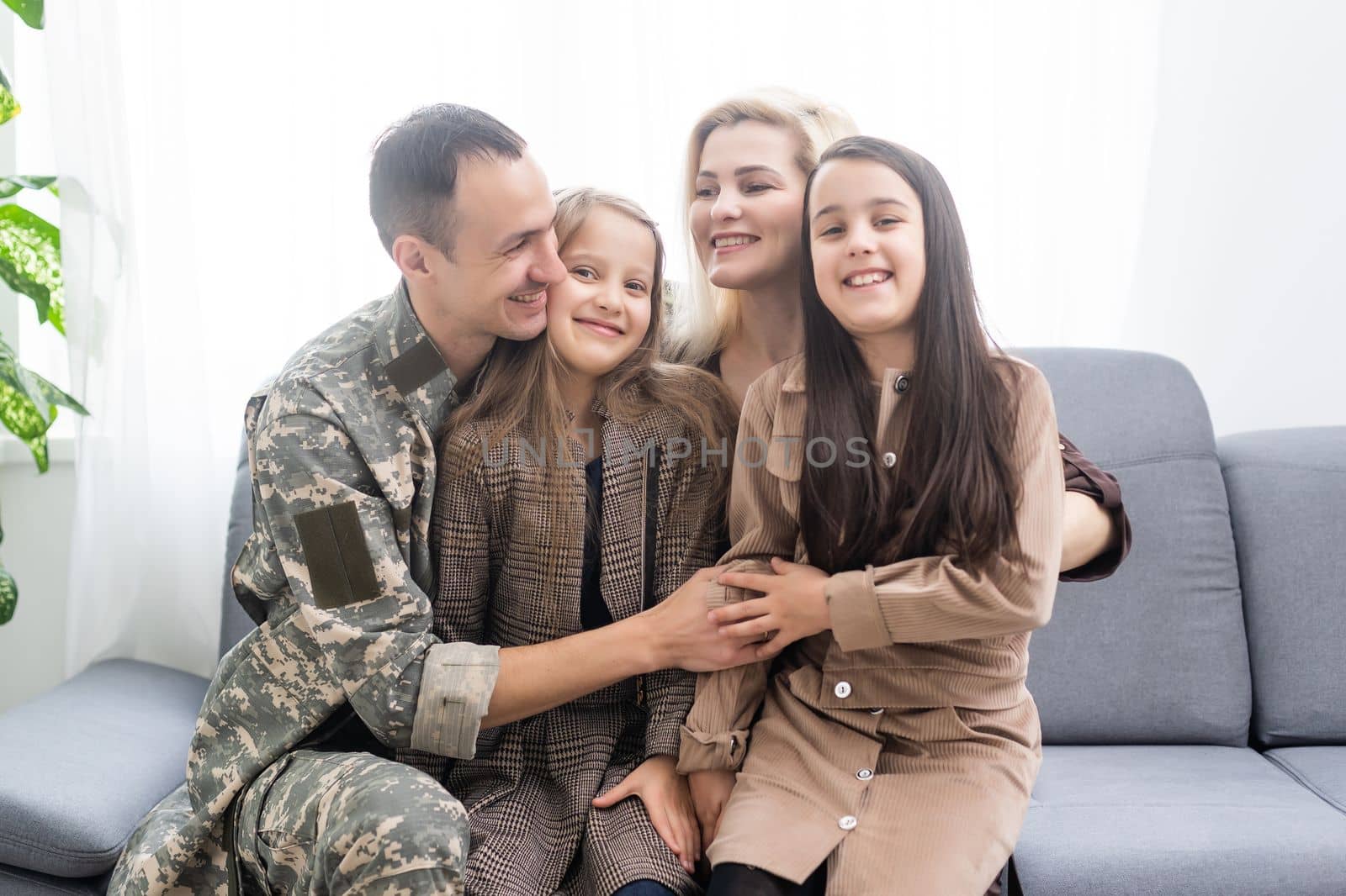 Soldier On Leave Hugging Daughter.