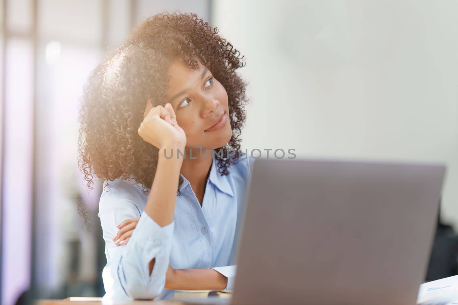 Attractive black businesswoman using laptop video conference call, business colleagues. Communicating with team by itchaznong