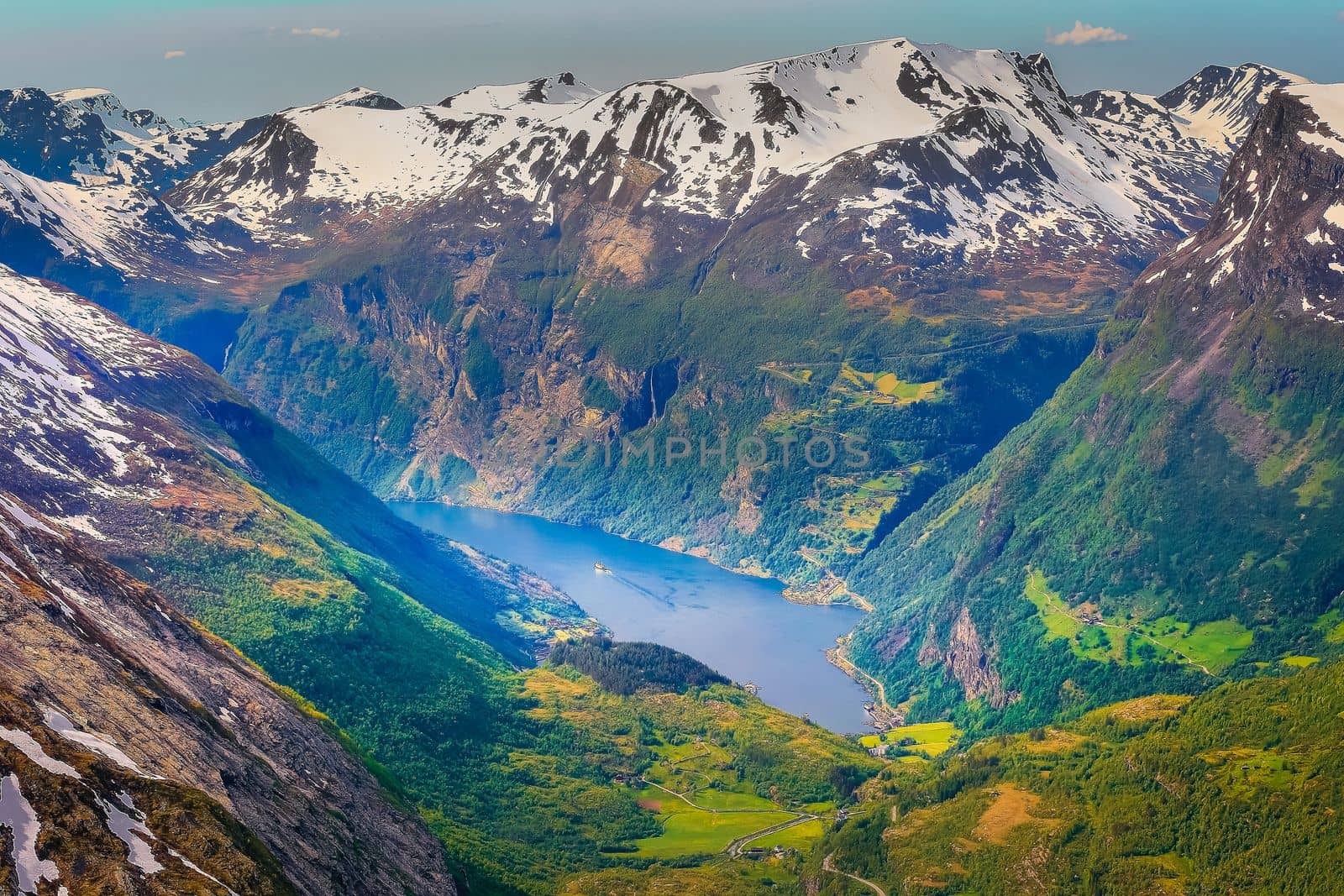 Peaceful Geirangerfjord with boat and waterfall, Norway , Nordic Countries