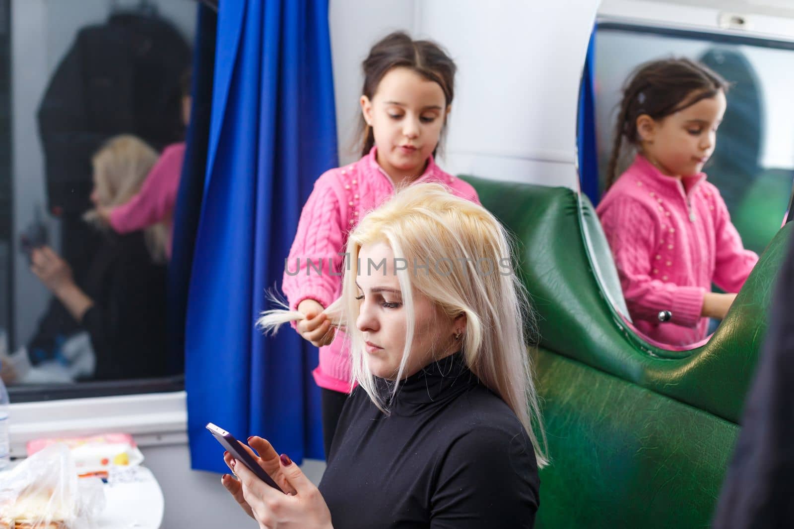 daughter and mother in the train.