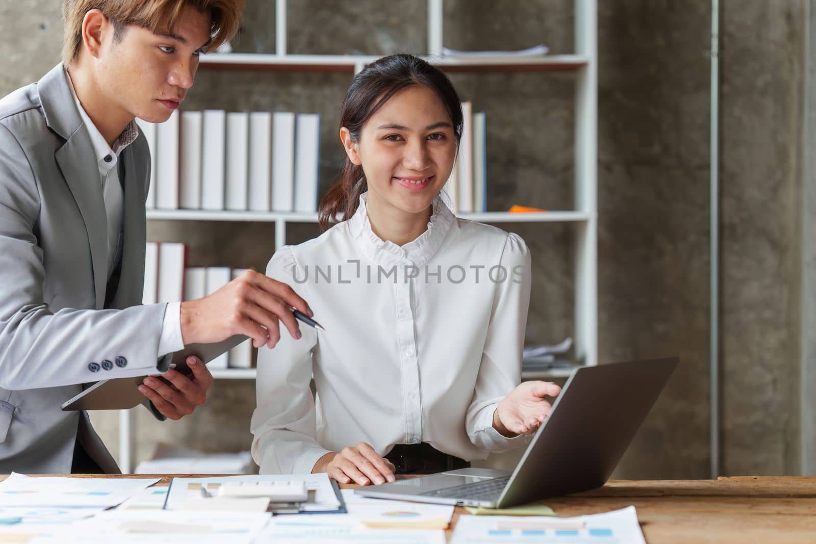 Group of Business people meeting for analysis data figures to plan business strategies. Business discussing, finance concept.