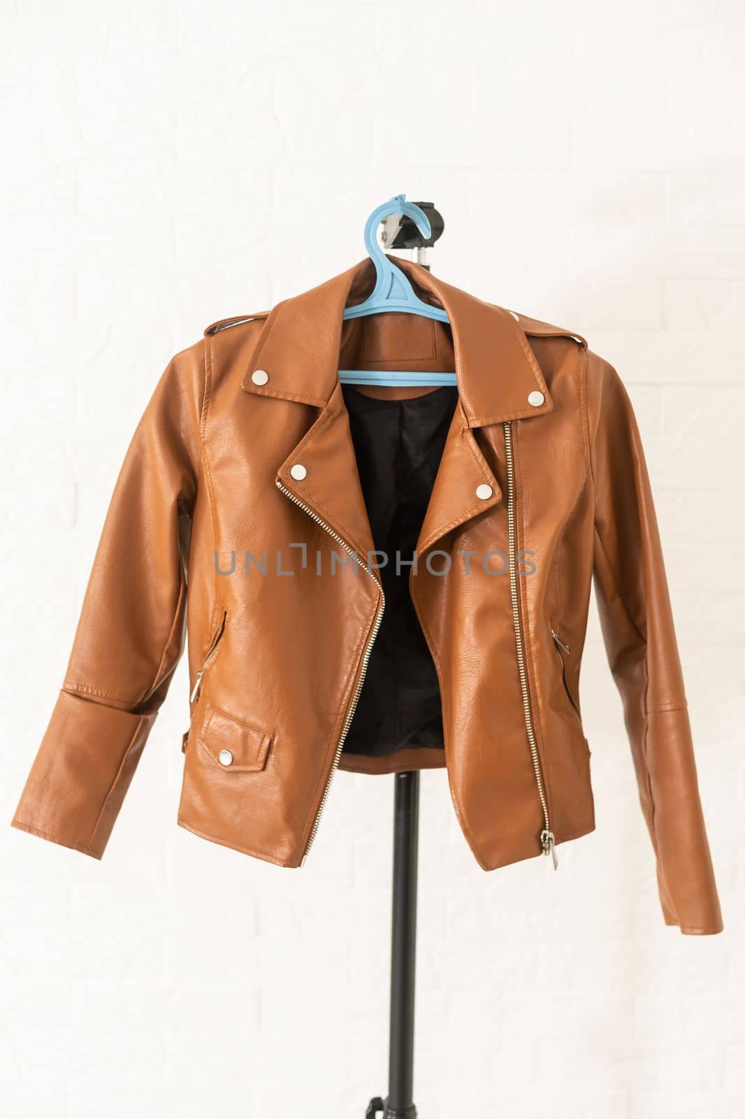 women's jacket on a hanger white background by Andelov13