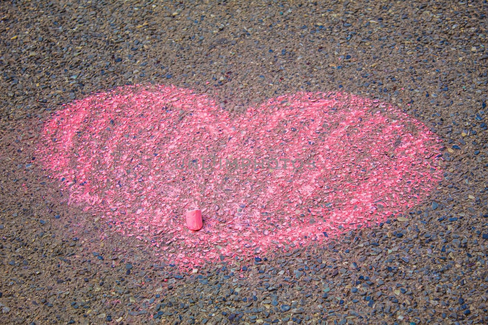 Children's drawings on the asphalt with chalk. Selective focus. by mila1784