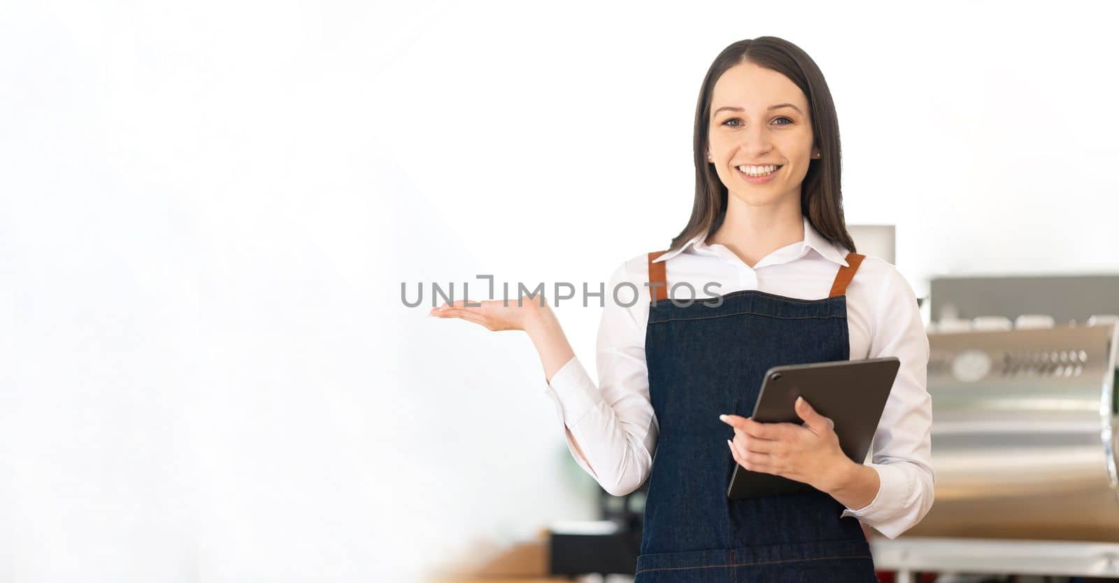 Opening a small business, AHappy Asian woman in an apron standing near a bar counter coffee shop, Small business owner, restaurant, barista, cafe, Online, SME, entrepreneur, and seller concept..